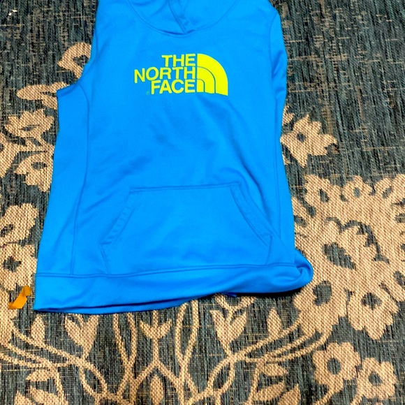 The North Face Jackets & Blazers - I am selling a blue and neon green North face hoodie that is a extra large